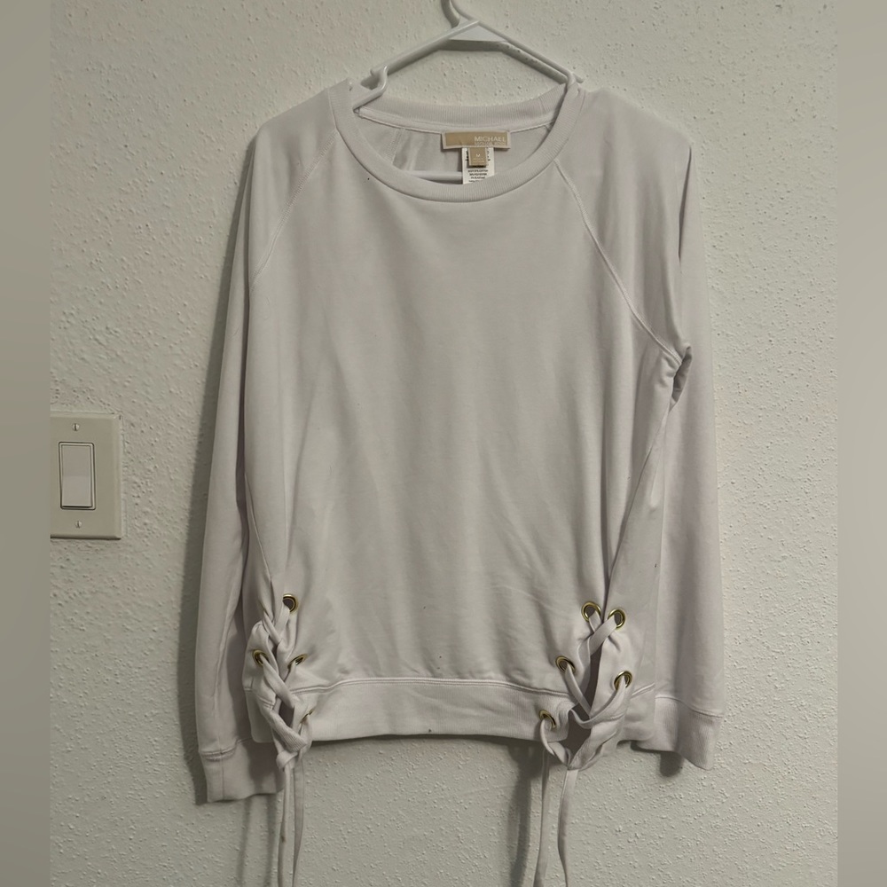 Long sleeve sweater with ties on either side